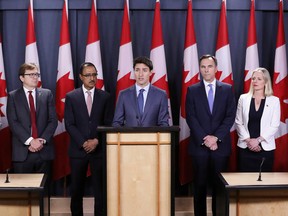Canada's Prime Minister Justin Trudeau speaks during a news conference about the government's decision on the Trans Mountain Expansion Project with Fisheries Minister Jonathan Wilkinson, Natural Resources Minister Amarjeet Sohi, Finance Minister Bill Morneau and Environment Minister Catherine McKenna in Ottawa, Ontario, Canada, June 18, 2019.