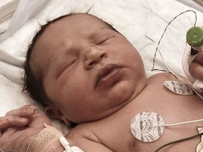 In a photo provided by Forsyth County Sheriff's Office, Baby India, who was found on June 6, 2019, abandoned in a plastic bag in the woods. The Georgia newborn who defied the odds of survival after being abandoned is winning over the hearts of prospective parents, hundreds of whom have offered to adopt her, the head of a state adoption agency said.