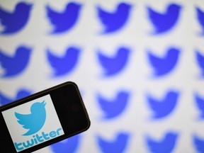 Twitter announced Thursday that it would hide messages from major political figures who break the company's rules for harassment or abuse behind a warning label, but would not take the messages down, in a move that could heighten the debate over political bias on the service.