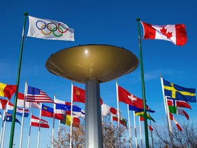 The flags and Olympic cauldron at Canada Olympic Park were photographed on Monday, November 12, 2018.