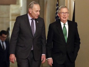 FILE - In this Feb. 7, 2018, file photo, Senate Majority Leader Mitch McConnell, R-Ky., and Senate Minority Leader Chuck Schumer, D-N.Y., left, walk to the chamber the Capitol in Washington. Some of the old timers in the Senate are getting fed up with the drought of legislation. But after weeks of focus on approving President Trump's backlog of nominees, there's a chance the chamber will soon be stretching its legs again.