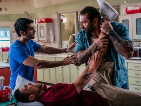 Dave Bautista, Rene Moran, and Kumail Nanjiani in Stuber.