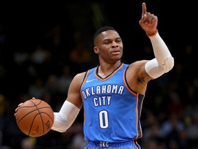 Russell Westbrook #0 of the Oklahoma City Thunder brings the ball down the court against the Denver Nuggets at the Pepsi Center on October 10, 2017 in Denver, Colorado.