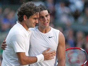 Rafael Nadal (R) is congratulated by Roger Federer on July 6, 2008, after winning their final tennis match of the 2008 Wimbledon championships at The All England Tennis Club in southwest London.