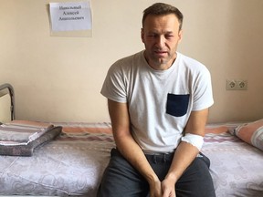 A handout image made available on the official website of Russia's opposition leader Alexei Navalny (Navalny.com) on July 29, 2019, shows Russia's jailed opposition leader Alexei Navalny sitting on a hospital bed in Moscow.