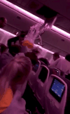 Oxygen masks fall during turbulence in the Air Canada AC33 flight while over the mid-Pacific.