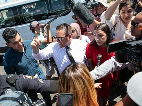 U.S. Congresswoman Alexandria Ocasio-Cortez is swarmed by media after touring a Border Patrol Facility where migrant children are being held, on July 1, 2019, in Clint, Texas.