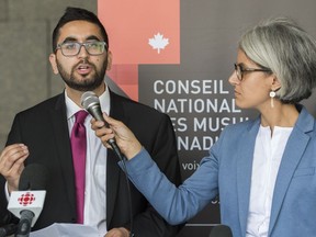 Members of the National Council of Canadian Muslims Mustafa Farooq, left, and Bochra Mana speak during a news conference in Montreal, Monday, June 17, 2019, where plans were outlined to lawfully challenge the Quebec government's Bill 21.