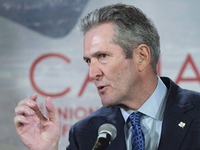 Manitoba Premier Brian Pallister responds to questions during a news conference at the first ministers meeting in Montreal on December 7, 2018. Manitoba Premier Brian Pallister is promising to stop charging the provincial sales tax on home insurance if he's re-elected Sept. 10.