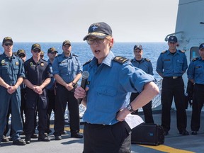 Standing NATO Maritime Group 2 Commander, Commodore Josée Kurtz addresses the crew of Flag Ship Her Majesty's Canadian Ship Toronto on the flight deck while in the Mediterranean Sea on June 21, 2019 in this handout photo.