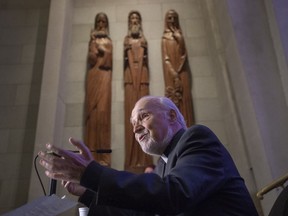 Father Claude Grou speaks to the media after celebrating mass at St. Joseph's Oratory Friday, March 29, 2019 in Montreal.A man charged with stabbing a Catholic priest during a mass streamed on the internet from Montreal's St. Joseph's Oratory in March has been found not criminally responsible.