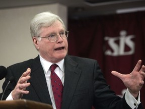 Outgoing Canadian Ambassador Michael Kergin gestures during an address before the Center for Strategic and International Studies (CSIS), Monday, Feb. 28, 2005, in Washington. A former Canadian Ambassador to the United States says Canadian government officials and business leaders need to put a on full-court press to move products stateside.