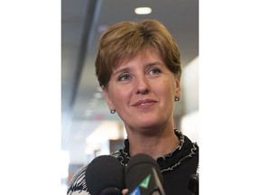 Marie-Claude Bibeau, Minister of Agriculture and Agri-Food, speaks during a news conference following a meeting with the the pork and beef industries in Montreal, on July 3, 2019. Canada's agriculture ministers has announced $8.3 million in funding to support Canada's beef industry, the bulk of it aimed at reaching new markets.