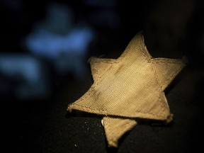 A yellow star to represent the Star of David, made of fabric on display in the Holocaust Memorial Center in Budapest, Hungary, Thursday, Jan. 24, 2019. Statistics Canada officials estimate the number of people identifying as Jewish in the 2016 census could have been double what it was if not for a small change on the questionnaire.