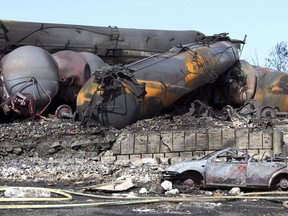 Wrecked oil tankers and debris from a runaway train in Lac-Megantic, Que. are pictured July 8, 2013. THE CANADIAN PRESS/ho, SQ MANDATORY CREDIT