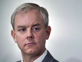 Dennis Oland attends a news briefing by his legal team in Saint John, N.B., on Nov. 20, 2018. The verdict in the Oland trial in Saint John, N.B. will come out Friday morning.