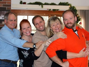 Members of the Weaver family (left to right) father John Weaver II, daughter Sara, son Matt, mother Linda and son John Weaver III are shown in a family handout photo. A family of three American men, John Weaver II and his sons John Weaver III and Matt Weaver were among the seven people on a float plane that crashed into a remote Labrador lake on Monday. THE CANADIAN PRESS/HO-Weaver Family MANDATORY CREDIT