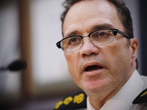 Deputy Chief Danny Smyth speaks during a press conference in Winnipeg, on Dec. 11, 2015. The chief of police in Winnipeg says he sent an internal memo to officers to share his frustration about a lack of addictions resources as the city deals with an epidemic of violence.