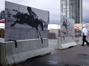Concrete barriers sit in place for the Calgary Stampede in Calgary, Tuesday, July 3, 2018. More security cameras, metal detectors and bag searches will be in place at this year's Calgary Stampede but officials says there's no concern about any imminent attacks - it's just a matter of public safety.