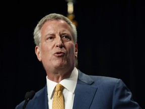 Democratic presidential candidate Bill de Blasio speaks during the Iowa Democratic Party's Hall of Fame Celebration, Sunday, June 9, 2019, in Cedar Rapids, Iowa. Officials from New York City have been visiting Quebec's north to learn more about the impact a possible hydro power deal with the provincial utility would have on Indigenous communities.