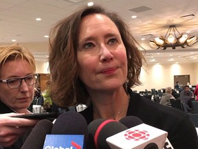 Bronwyn Eyre speaks to reporters in Regina, Tuesday, Nov.14, 2017. SaskEnergy says customers can expect commodity rates to stay the same for the next two years.