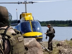 RCMP search an area near Gillam, Man. in this photo posted to their Twitter page on Tuesday, July 30, 2019. The RCMP have been searching remote areas in northern Manitoba for more than a week in the hopes of finding B.C. murder suspects Bryer Schmegelsky and Kam McLeod.