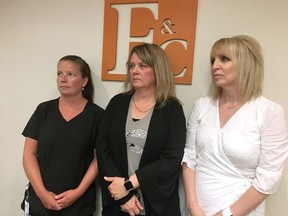 (L-R) Bridget Thornton, Pamela Moxon and Lori Wheeler are seen in Fredericton on Thursday, July 18, 2019. The three women are part of a proposed class action lawsuit. Lawyers have filed documents with a New Brunswick court seeking a class action lawsuit after a Fredericton massage therapist made secret video recordings of more than 100 of his female patients in various states of undress.