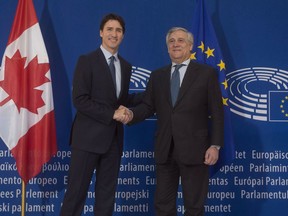 Lawmakers in France begin the ratification of the comprehensive trade agreement between the European Union and Canada as Prime Minister Justin Trudeau welcomes the leaders of the 28-country bloc to Montreal on Wednesday. Canadian Prime Minister Justin Trudeau is greeted by the President of the European Parliament Antonio Tajani as he arrives at the European Parliament in Strasbourg, France, Thursday, Feb. 16, 2017.