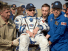 Canadian Space Agency astronaut David Saint-Jacques is carried to a medical tent shortly after he, NASA astronaut Anne McClain, and Roscosmos cosmonaut Oleg Kononenko landed in their Soyuz MS-11 spacecraft near Zhezkazgan, Kazakhstan on June 25, 2019.