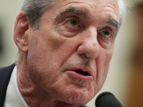 WASHINGTON, DC - JULY 24: Former Special Counsel Robert Mueller testifies before the House Intelligence Committee about his report on Russian interference in the 2016 presidential election in the Rayburn House Office Building July 24, 2019 in Washington, DC.