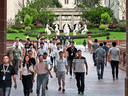 Huawei workers walk together at the end of their workday at the Research and Development campus on April 24, 2019 in Dongguan, China.