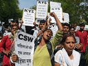 Indian activists and students protest against the political silence over the alleged rape of a child.