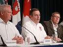 Alberta Premier Jason Kenney, centre, with Ontario Premier Doug Ford and Saskatchewan Premier Scott Moe on July 8. His promise to cut trade regulations comes amid a gathering of all 13 provincial and territorial premiers this week in Saskatoon.