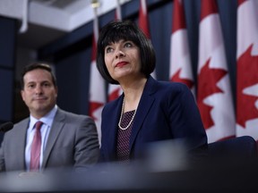 Minister of Health, Ginette Petitpas Taylor and Liberal MP Marco Mendicino, left, speak at a press conference regarding the Canada Food Guide and their letter to Conservative leader Andrew Scheer, at the National Press Theatre in Ottawa on Monday, July 22, 2019.