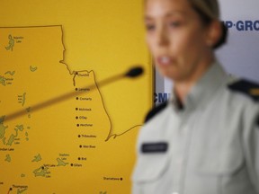 RCMP Cpl. Julie Courchaine speaks to media about the ongoing RCMP search in Northern Manitoba for the BC murder suspects in Winnipeg, Monday, July 29, 2019. RCMP are searching in the community of York Landing after two people matching the description of Bryer Schmegelsky and Kam McLeod were spotted near the dump on Sunday.