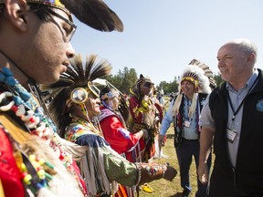 British Columbia Premier John Horgan and Assembly of First Nations Chief Perry Bellegarde arrive for a meeting of Premiers and Indigenous Leaders in Big River First Nation, Sask. on Tuesday, July 9, 2019.