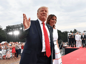 U.S. President Donald Trump and First Lady Melania Trump leave after attending the "Salute to America" Fourth of July event at the Lincoln Memorial in Washington, DC, July 4, 2019.