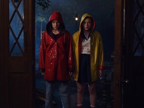 Stranger Things's Mille Bobby Brown and Sadie Sink in a nod to The Shining's twins.