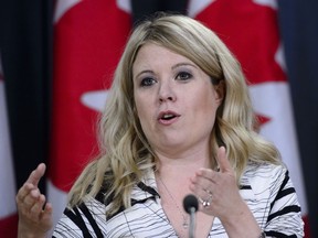 Conservative MP Michelle Rempel speaks following the tabling of the 2019 Spring Reports of the Auditor General in Ottawa on May 7, 2019. A Conservative MP says she would like to see a national framework developed on the use of emotional service animals in public spaces after watching her husband encounter numerous barriers while travelling in Canada with his dog, Midas.