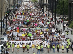 Protesters march to offices of the U.S. Immigration and Customs Enforcement on July 13, 2019 in Chicago, Illinois.