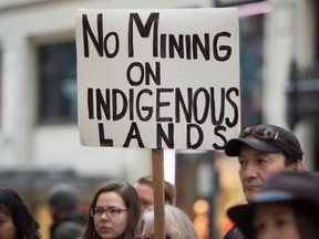 Members of the Tsilhqot'in First Nation hold a rally outside the federal court in downtown Vancouver, B.C., Monday, Jan. 30, 2017.