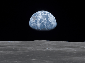 An Earthrise viewed from lunar orbit by Apollo 11 prior to landing on July 20, 1969.