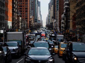 In this file photo taken on March 15, 2019 traffic moves on 2nd Avenue in the morning hours in New York City.