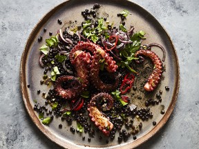Grilled octopus with squid ink lentils