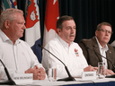 Alberta Premier Jason Kenney speaks to reporters while Ontario Premier Doug Ford and Saskatchewan Premier Scott Moe listen, July 8, 2019.