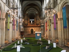 Officials at Rochester Cathedral in Kent, U.K., are hoping to attract a younger crowd by installing a mini-putt in the nave of the historic church — the second oldest in England.