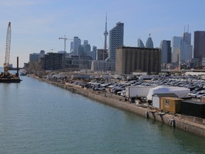 The downtown skyline and CN Tower are seen past the eastern waterfront area envisioned by Alphabet Inc's Sidewalk Labs as a new technical hub in the Port Lands district of Toronto, Ontario, Canada April 3, 2019.