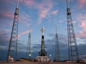 In this file handout photo released by SpaceX on May 14, 2019 shows Falcon 9 a day before the scheduled launch of 60 Starlink satellites from Space Launch Complex 40 at Cape Canaveral Air Force Station in Cape Canaveral, Florida.