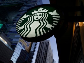 A Starbucks sign is shown on one of the company's stores in Los Angeles, California.