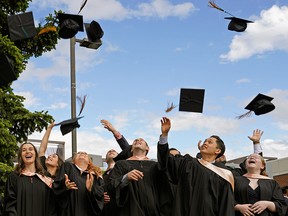 University of Alberta graduates celebrate after their convocation in Edmonton on June 4, 2019.